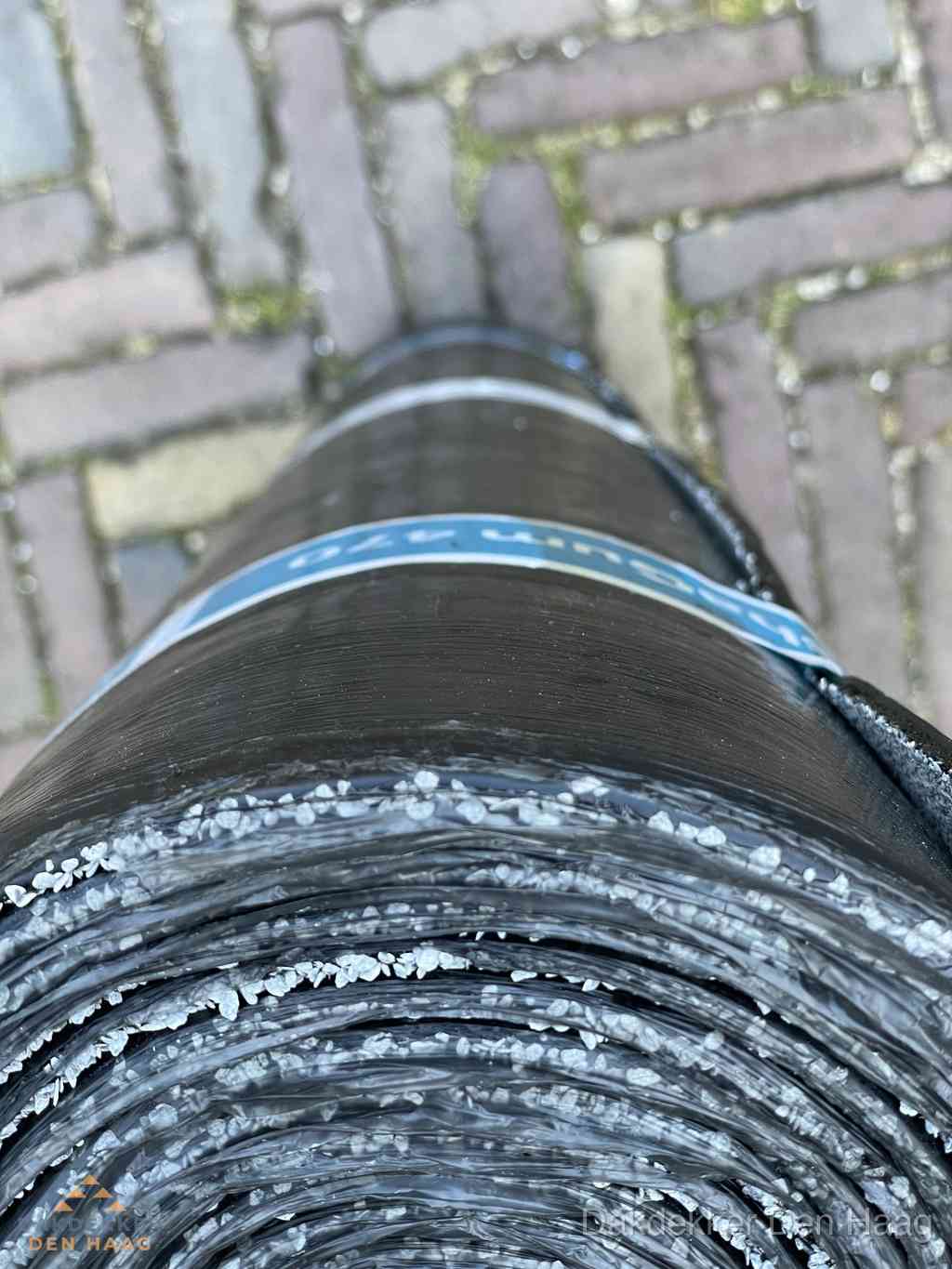 Rol bitumen dakleer met leislag voor plat dak in Den Haag Rol bitumen dakleer met leislag voor plat dak in Den Haag